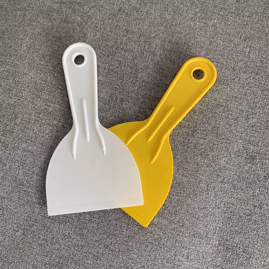 Coltello spatola in plastica rossa